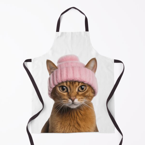 Item preview, Cozy Abyssinian Cat Wearing Pink Winter Hat Trendy Animal Fashion Artwork designed and sold by LazyOwlStore.