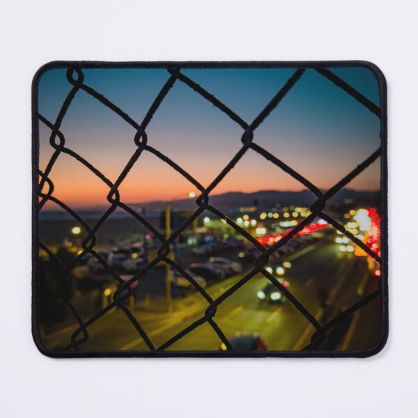 Item preview, Blurry Traffic through Chain Link Fence designed and sold by KarenVarr.