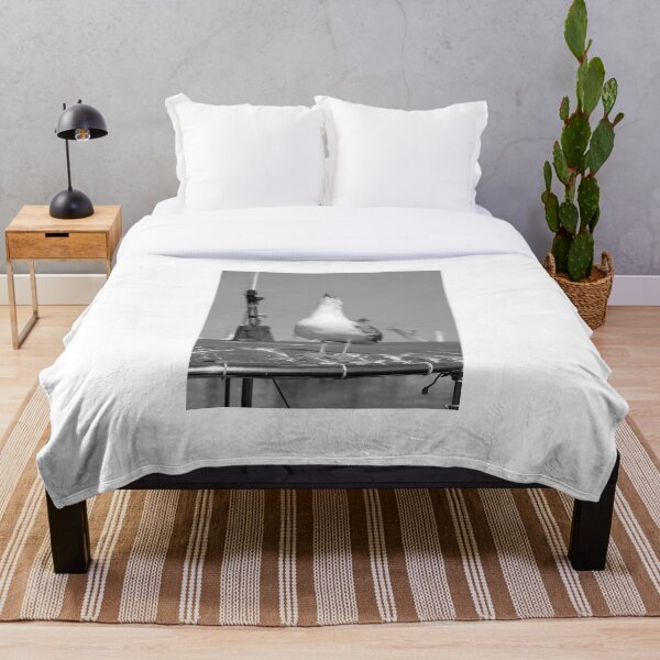 Item preview, Howling seagull in the boat on the beach designed and sold by RenataPhoto.