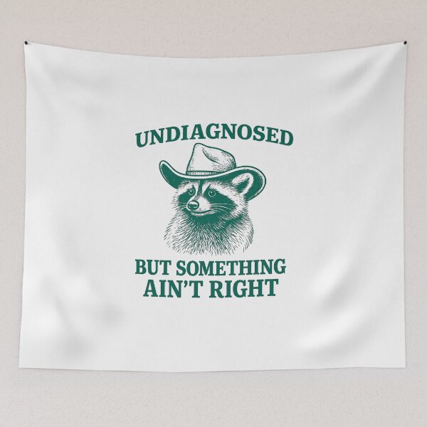 Item preview, Undiagnosed But Something Aint Right Vinyl Sticker - Funny Raccoon Cowboy Meme designed and sold by ezuldeen48.