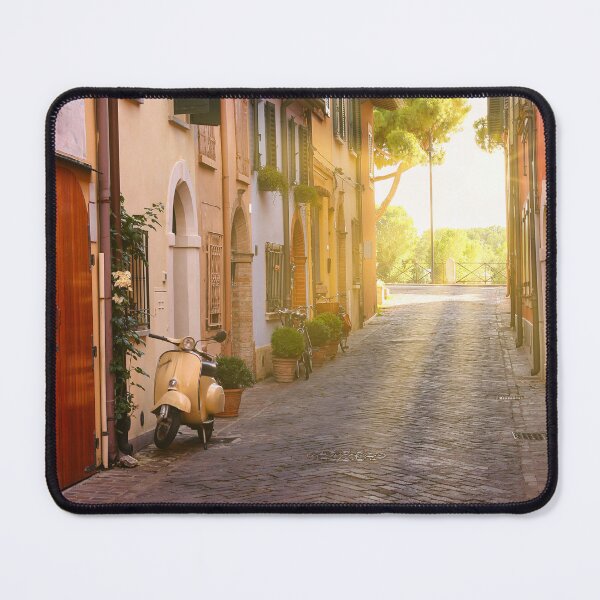 Item preview, Cobblestone street with scooter and old houses in Rimini, Italy designed and sold by goceris.