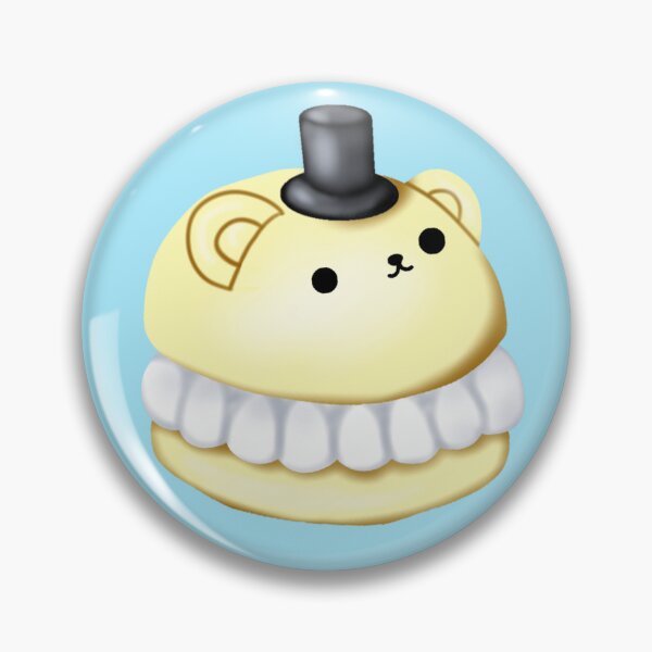 Item preview, a small macaron cake in the shape of a yellow bear, with a small black hat on its head designed and sold by katecheerycake.