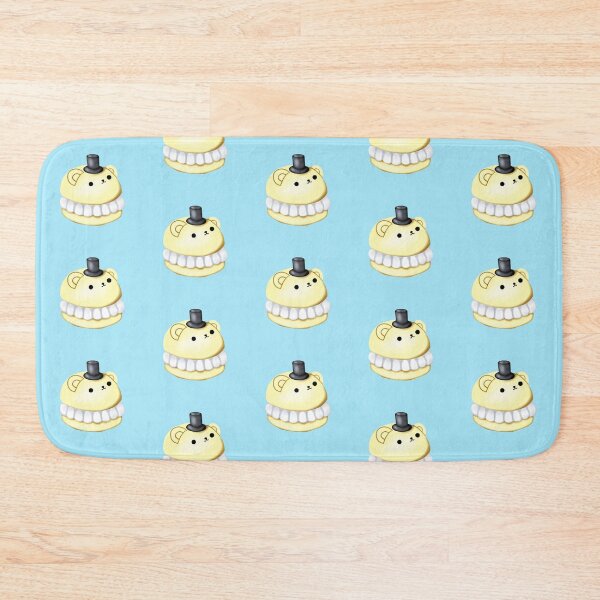 Item preview, a small macaron cake in the shape of a yellow bear, with a small black hat on its head designed and sold by katecheerycake.