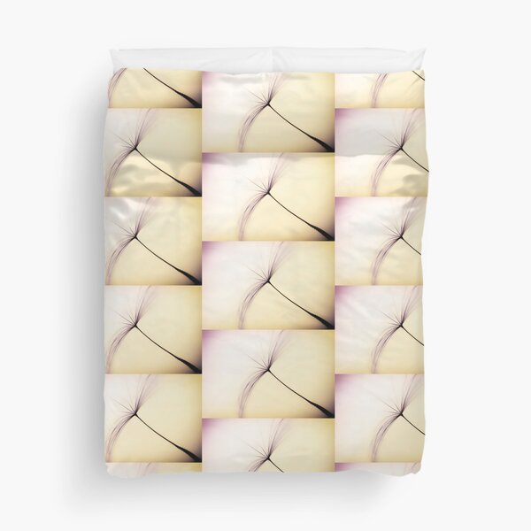 Whispered Wishes on a Dandelion Seed Duvet Cover