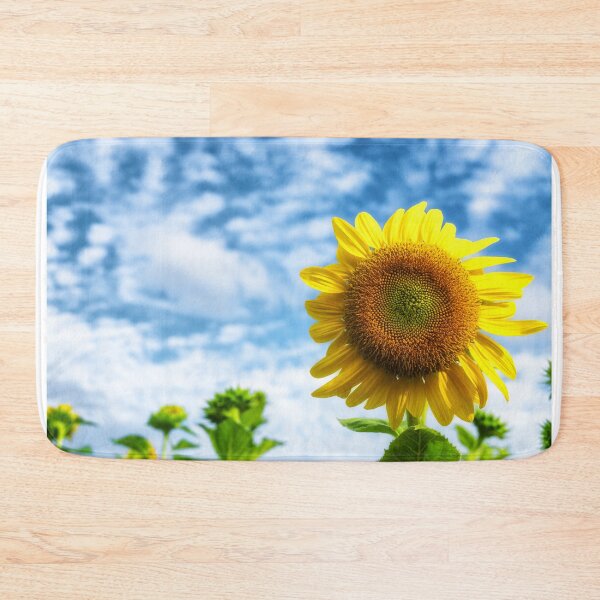 Item preview, The photo captures vibrant sunflowers blooming across a sunny farm field. designed and sold by DezibyDang.