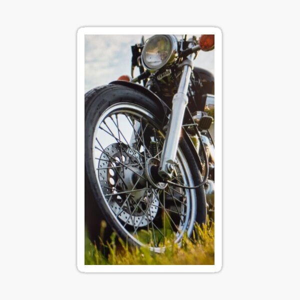 Item preview, A beautiful classic mtorbike standing in the green grass designed and sold by kalabrahma06.