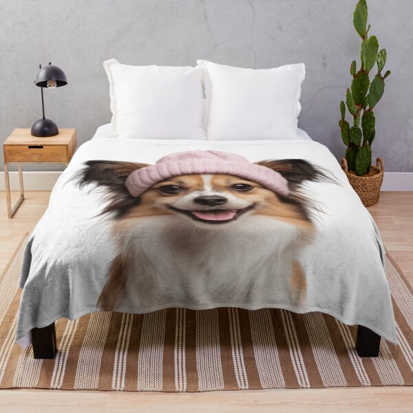 Item preview, Cozy Papillon dog Wearing Pink Winter Hat Trendy Animal Fashion Artwork designed and sold by LazyOwlStore.