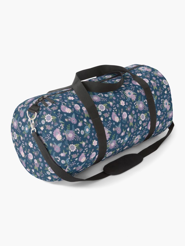 Thumbnail 1 of 3, Duffle Bag, Pretty Spring bouquets - pink and mauve pattern on navy by Cecca Designs designed and sold by Cecca-Designs.