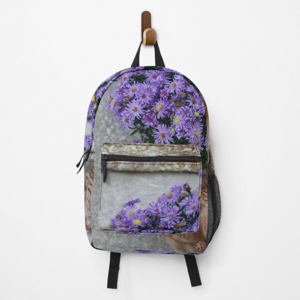 Item preview, Violet Flowers In The Clay Pot On An Ancient Italian Wall designed and sold by MadeulookArt.
