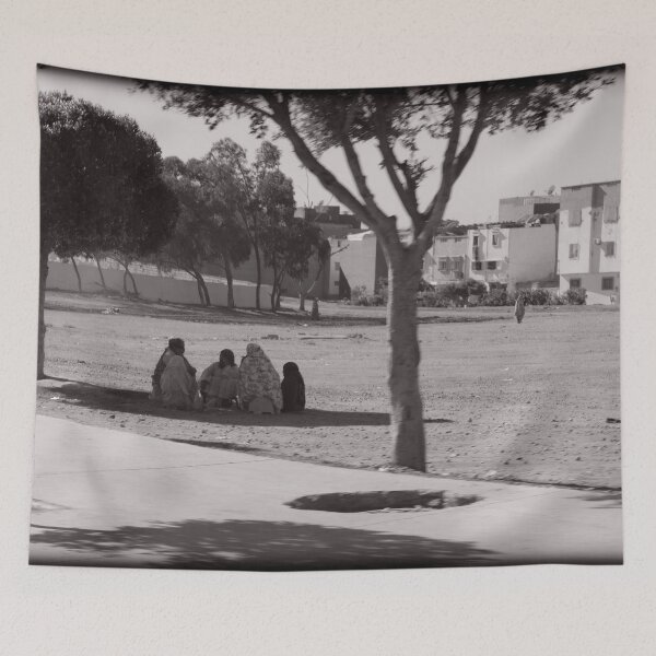 Item preview, Agadir Black & White Scene – Woman Sitting in the City designed and sold by photo-travel.