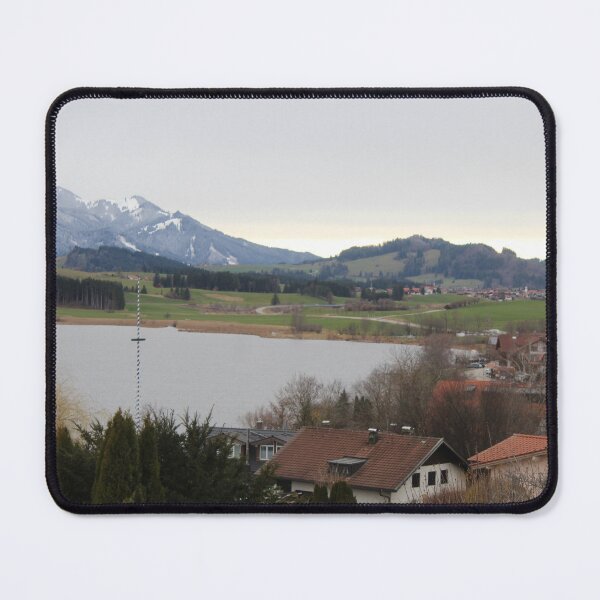 Item preview, Beautiful scene with houses, a lake and the Alps (in Füßen, Germany) designed and sold by jonneyboy99.