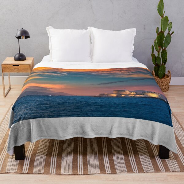 Item preview, Dramatic sky sunset over the castle Bourtzi in Nafplio, Peloponnese, Greece designed and sold by goceris.