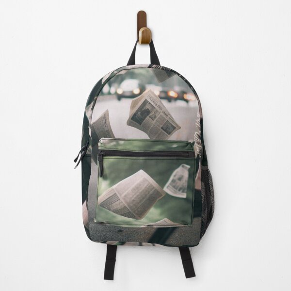 Item preview, Scattered News – Floating Newspaper Pages on Empty Park Bench designed and sold by ashokreddy343.