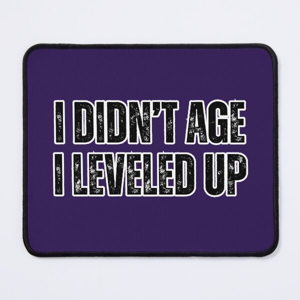 Item preview, I Didn’t Age I Leveled Up - Funny Birthday Gamer Quote designed and sold by TenkaTees.