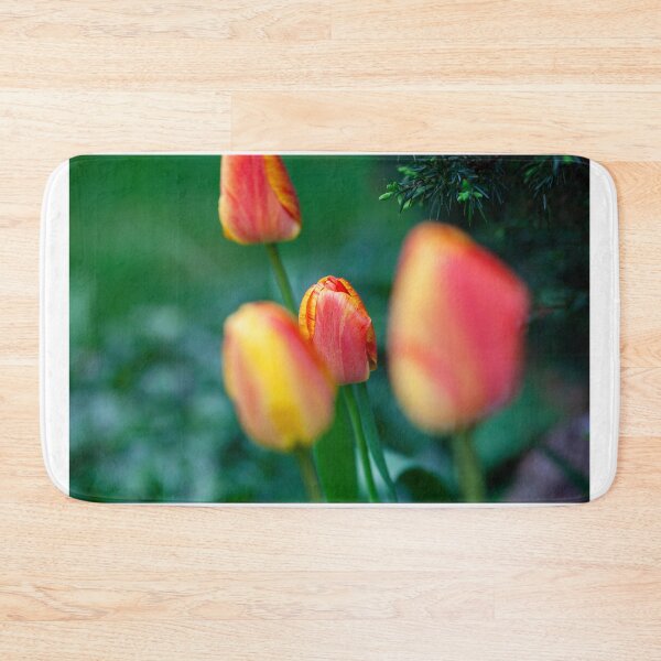 Item preview, Closed tulip in yellow-orange – spring flower photography designed and sold by timoboyken.