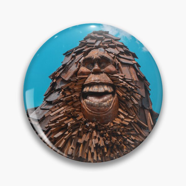 Item preview, Smiling Bigfoot Wood Sculpture Against Blue Sky designed and sold by MichaelPictures.