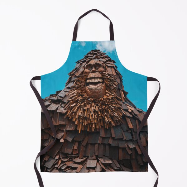 Item preview, Smiling Bigfoot Wood Sculpture Against Blue Sky designed and sold by MichaelPictures.