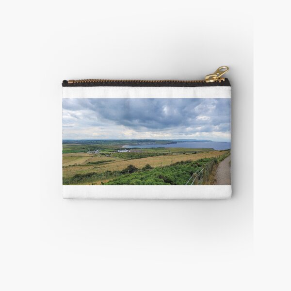 Item preview, Grassy planes seen from above bordering ocean designed and sold by CholiBe.