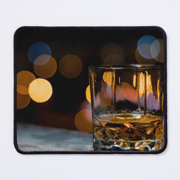 Item preview, Single malt whiskey in a whiskey glass on a summer night with the city bokeh in the background designed and sold by PR7 photography.