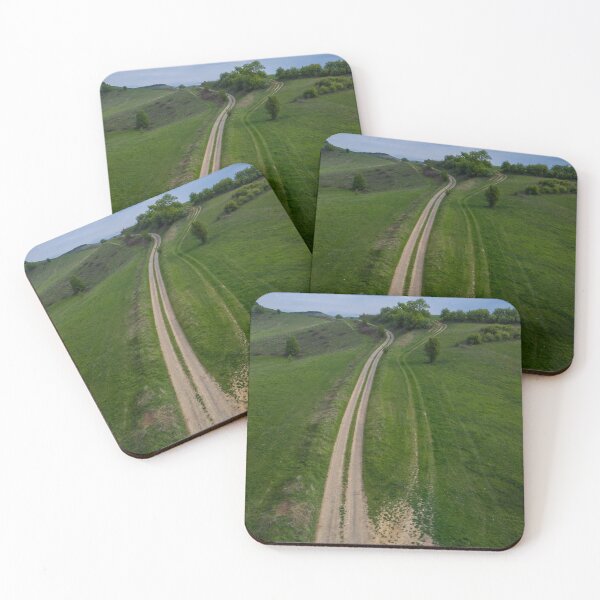 Item preview, Aerial view of gravel road cutting through grass field near forest designed and sold by PR7 photography.