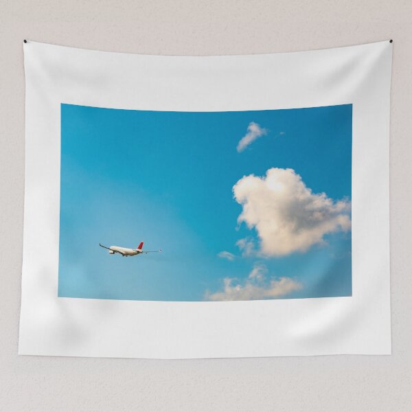 Item preview, Passenger Airplane Flying Against Blue Sky and Clouds designed and sold by Mats Silvan.