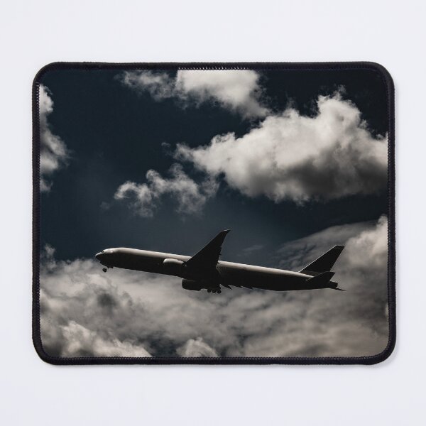Item preview, Passenger Airplane Flying Against Blue Sky and Clouds designed and sold by Mats Silvan.