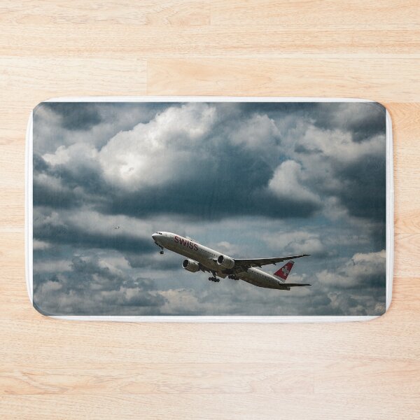 Item preview, Swiss Airlines Passenger Airplane Flying Against Blue Sky and Clouds designed and sold by Mats Silvan.