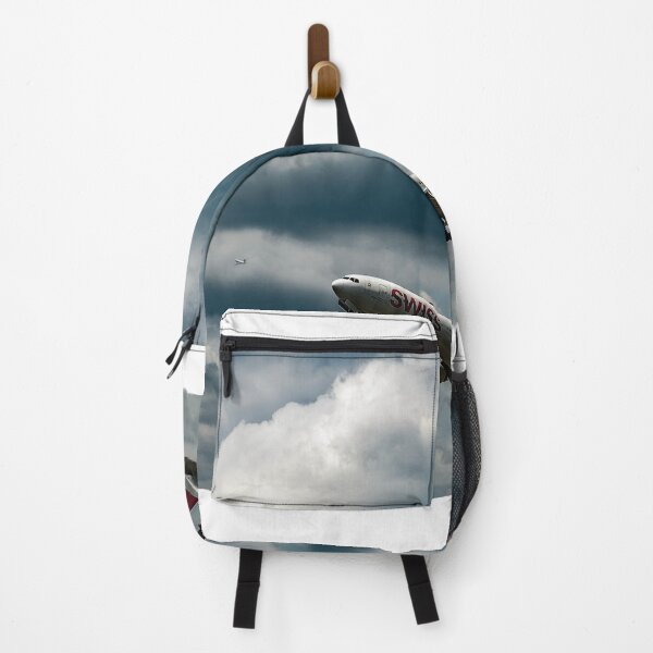 Item preview, Swiss Airlines Passenger Airplane Flying Against Blue Sky and Clouds designed and sold by Mats Silvan.