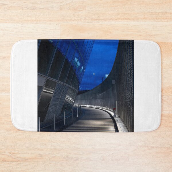 Item preview, Illuminated Road with a Wall and Modern Glass Building with Reflection to Circle in Dusk designed and sold by Mats Silvan.