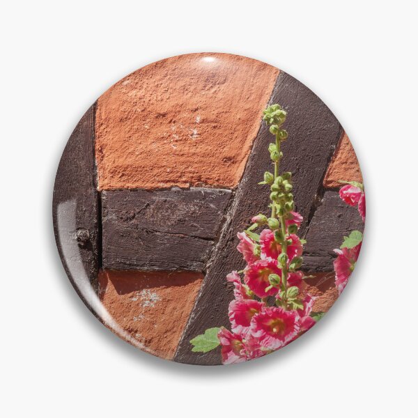 Item preview, Flowering pink hollyhocks in front of a half-timbered wall designed and sold by Torsten  Krüger.