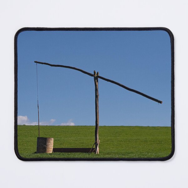 Item preview, Wooden sweep well on a farm with green grass and blue sky designed and sold by PR7 photography.