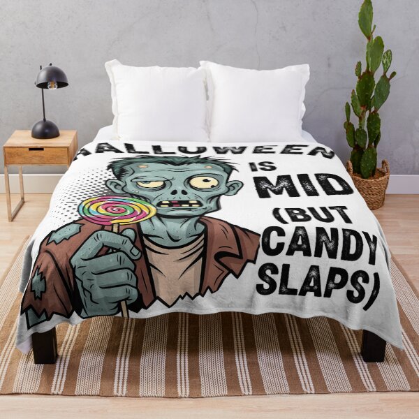 Item preview, Halloween Is Mid But Candy Slaps Zombie Lollipop Funny Spooky Season Humor Shirt designed and sold by AnnDesignStudio.