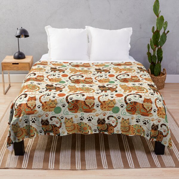 Item preview, Colorful folk art patterned cats, vibrant orange and teal hues, playful felines with yarn and paw prints, bohemian animal illustration, cream background, artistic and cheerful design designed and sold by ArtifactVault.
