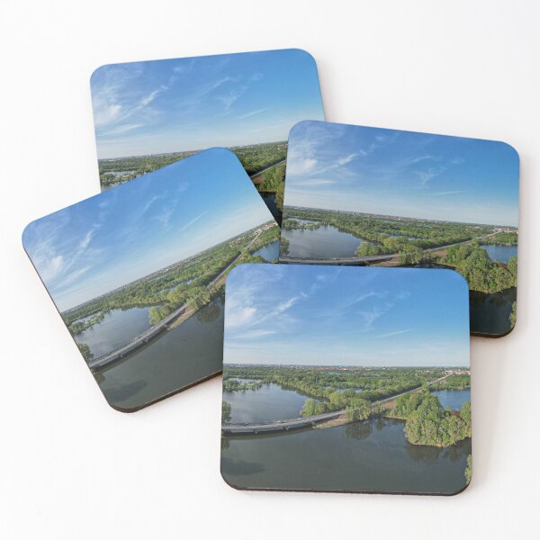 Item preview, Hannover Ricklinger Teiche Panorama - Sunny day aerial view of a tree-lined lake, blue water, white clouds in the sky of Germany designed and sold by TravelLensPro.