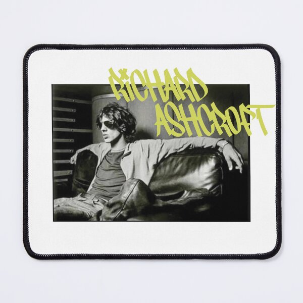 Item preview, Richard Ashcroft relaxing on a couch (yellow text) designed and sold by Manchester Design Studio.