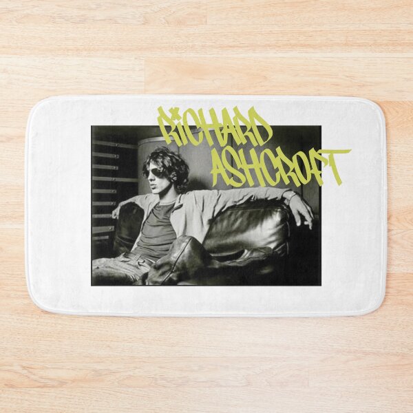 Item preview, Richard Ashcroft relaxing on a couch (yellow text) designed and sold by Manchester Design Studio.