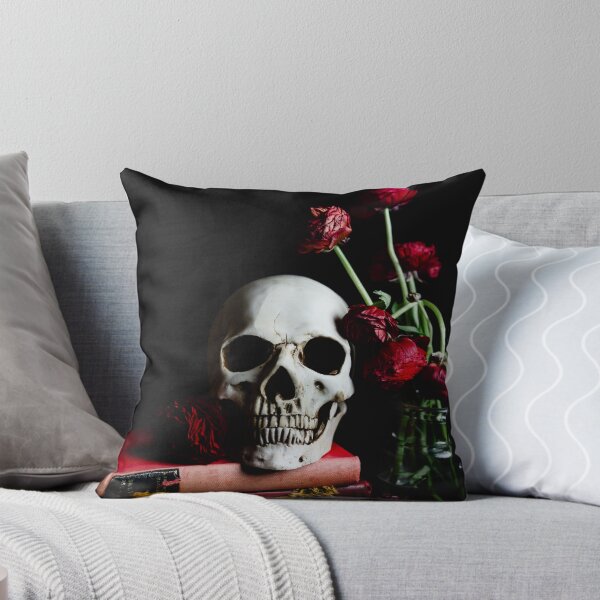 Item preview, Skull on books with ranunculus  designed and sold by Grave Capture Photos.