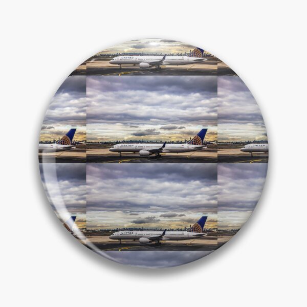 Item preview, United Airlines And Manhattan Skyline At JFK Airport designed and sold by Paul Thompson Photography.