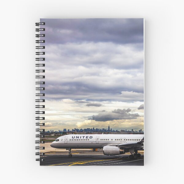 Item preview, United Airlines And Manhattan Skyline At JFK Airport designed and sold by Paul Thompson Photography.