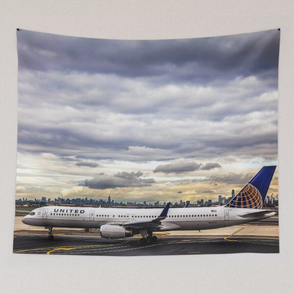 Item preview, United Airlines And Manhattan Skyline At JFK Airport designed and sold by Paul Thompson Photography.