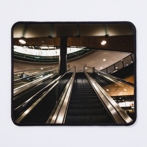 Item preview, Inside Illuminated Zurich Airport with Escalator in Blurred Motion at Night designed and sold by Mats Silvan.