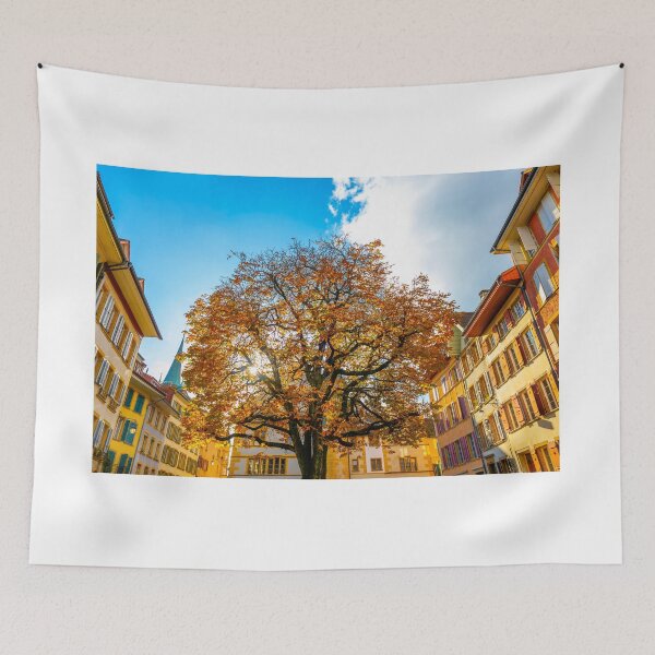 Item preview, Beautiful Old Town with a Tree in a Sunny Day in Autumn in Biel designed and sold by Mats Silvan.