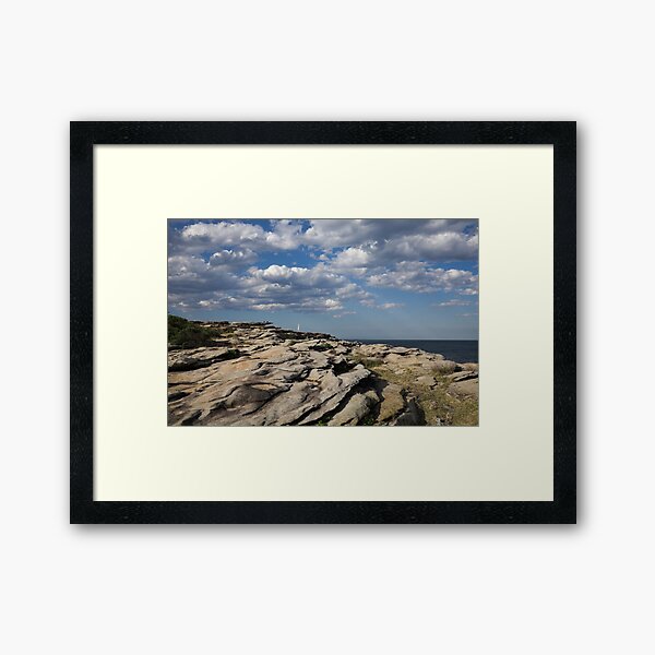 Eroding Layers of Rocky Clifftops Framed Art Print