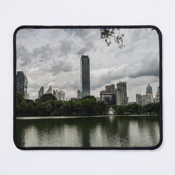 Item preview, Modern Skyline with Reflective Water and Lush Greenery designed and sold by OdysseyProject.