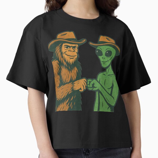 Item preview, Western Cowboy bigfoot and alien bumping hands designed and sold by DemureArtsy.