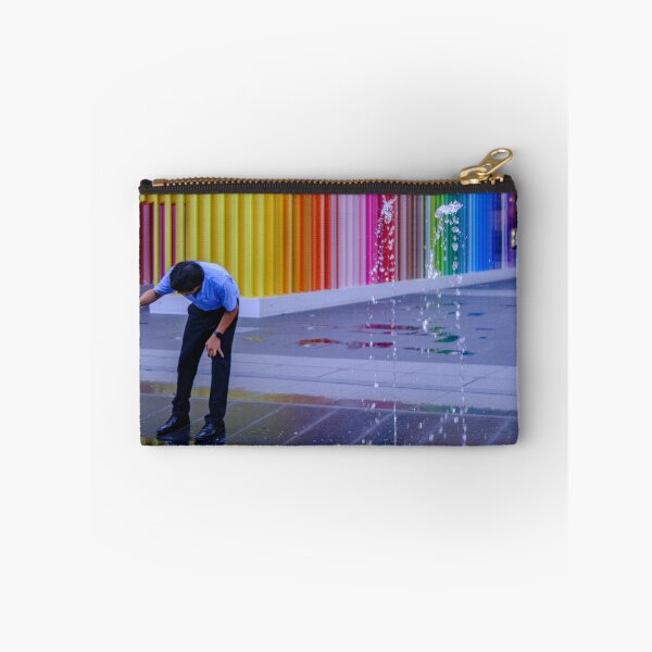Item preview, Empleado de oficina local disfrutando del parque acuático en la estación Takanawa Gateway en Tokio, Japón designed and sold by Pix4Japan.