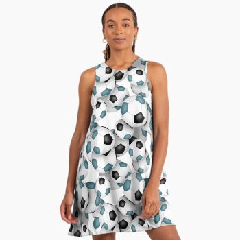 image of model wearing a cute a line dress with pattern of teal and black soccer balls