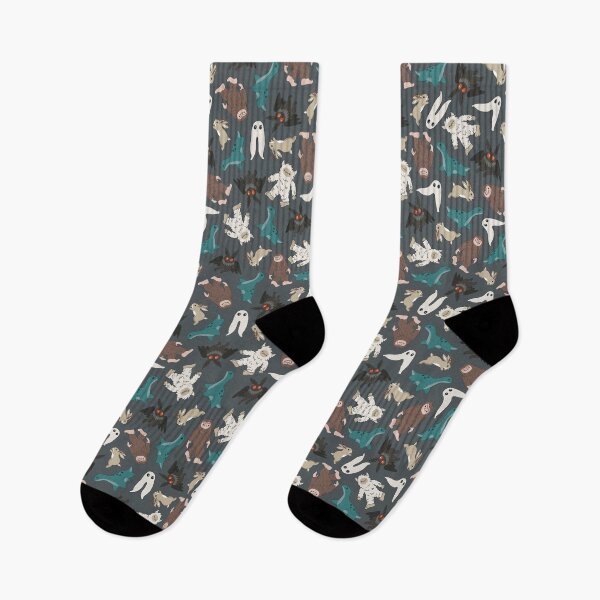 Item preview, cute cryptids in dark blue gray - Loch Ness monster, mothman, Bigfoot, Sasquatch, jackalope, Fresno night crawler designed and sold by Becca Alessi.