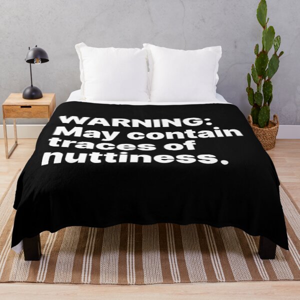 Item preview, Warning: May contain traces of nuttiness | White text designed and sold by ThingsOnTees.