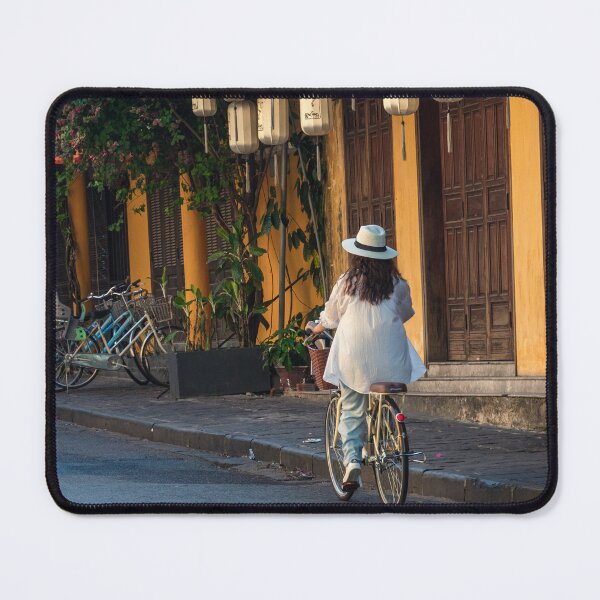 Item preview, Street scene of a person cycling down the street in Hoi An designed and sold by WorldScenery.